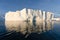 Climate change and global warming. Icebergs from a melting glacier in Greenland. UNESCO world heritage site.