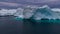 Climate Change and Global Warming - Icebergs from melting glacier in icefjord