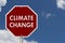Climate change red stop highway road sign