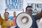 Climate change sign, protest and black man with megaphone for freedom movement. Angry, crowd screaming and young people