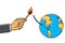 Climate crisis metaphor, hand holding lit match about to light the fuse on earth globe, cartoon, simple abstract graphic