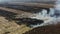 Climate emergency and change. Global warming. aerial drone fly over view of a grass fire. Version 2