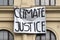 Climate Justice Banner outside building