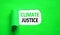 Climate justice symbol. Concept words Climate justice on beautiful white paper. Beautiful green paper background. Business