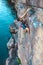 A climber above the water.