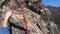 Climber climbs the rock. First person view. The camera on the helmet. Extreme climbing.