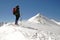 Climber facing wind and snow on the mountain