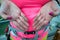 Climber hands close up, with dirt on them, after completing the Echernwand via ferrata Klettersteig route above Hallstatt