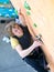 Climber hanging on climbing Wall at Competitions