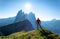 Climber on the high rocks background. Adventure and travel in the mountain region in the Dolomites, Italy