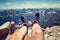 Climber in hiking boots on a rocky ledge