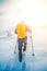 Climber hiking to a snowy hill during a winter holidays