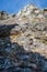 Climber on his back doing in escapades rocks mountain climbing - sport and health in sports