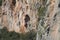 A climber on limestone rocks