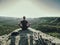 Climber man sit on rock, prepare for eating snack during rest