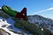 Climber resting on a peak in Retezat mountains, Romania