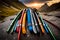 A climber\\\'s gear laid out on a rocky ledge, including carabiners, ropes, and quickdraws, ready for the ascent