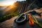 A climber\\\'s gear laid out on a rocky ledge, including carabiners, ropes, and quickdraws, ready for the ascent