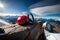 A climber\\\'s gear laid out on a rocky ledge, including carabiners, ropes, and quickdraws, ready for the ascent