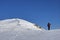 Climber on snowy mountain