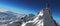 Climber on a snowy peak