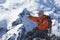 Climber Taking Picture Of Snowy Mountains