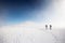 climbers climb the mountain in the snow. Winter mountaineering. two girls in snowshoes walk through the snow. mountaineering