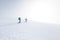 climbers climb the mountain in the snow. Winter mountaineering. two girls in snowshoes walk through the snow. mountaineering