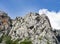 Climbers are climbing a rocky mountain in Paklenica, Croatia