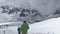 Climbers descend from the top of Elbrus. Panorama of the mountain, a nice sunny day.