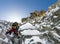 Climbers at the mountain summit in scenic Tian Shan range