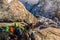 Climbers traversing a steep slope covered with snow