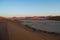 Climbing Big Daddy Dune during Sunrise with View onto Salt Pan