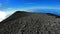 Climbing the crater of Semeru. Backpacker walking around Semeru crater on the top of mountain. POV shot first person veiw on breat