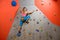 Climbing Gym. Young Woman Climber Bouldering. Extreme Sport and Indoor Climbing Concept