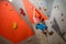 Climbing Gym. Young Woman Climber Bouldering. Extreme Sport and Indoor Climbing Concept