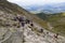 Climbing, mountaineering. Mountain hikers on the mountainside