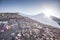 Climbing to the top of Mount Ararat covered with snow and glaciers over rocks and stones