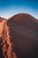 Climbing up the famous Dune 45, Sossusvlei, Namib-Naukluft National Park, Namibia