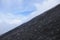 Climbing the volcano Semeru, Indonesia. Crater covered with debris