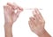 Clinical thermometer between fingertips