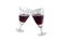 Clinking vintage crystal glasses with red wine isolated