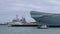 Clip of bow of HMS Prince of Wales with HMS Echo behind