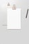 Clipboard with golden clip, blank sheets of paper and pen on white background. Template for branding identity