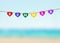 clipboard heart shape with summer wording hang on clothesline over summer beach background