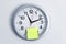 Clock and Adhesive Note