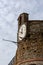 Clock at the castle in Riomaggiore Liguria Italy on April 21, 2019