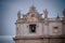 Clock on the Facade of the Basilic of Saint Peter in the Vatican City in the Centre of Rome