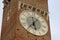Clock on Lamberti Tower on Piazza delle Erbe in Verona, Italy