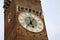 Clock on Lamberti Tower in Verona, Italy